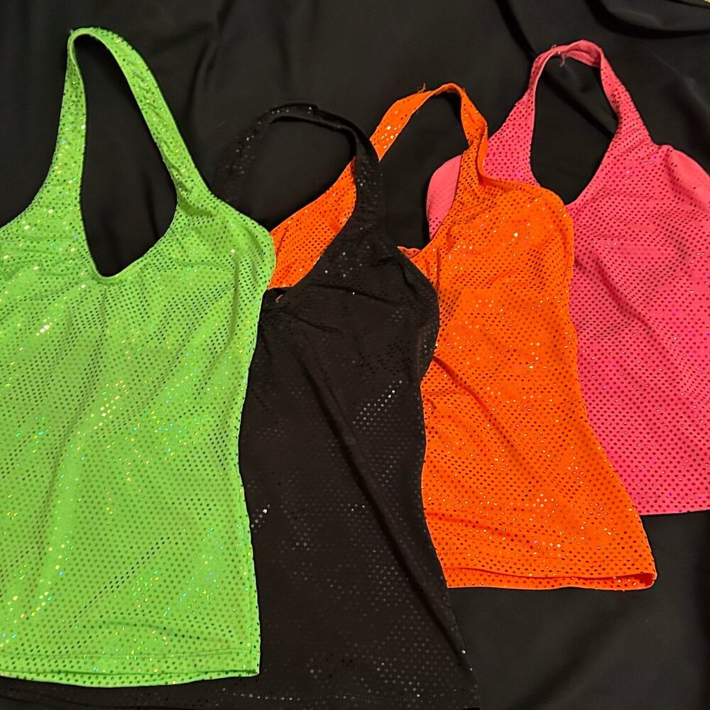 Four Shiny Dance Tops, Halter Style with built in bra and strappy back.